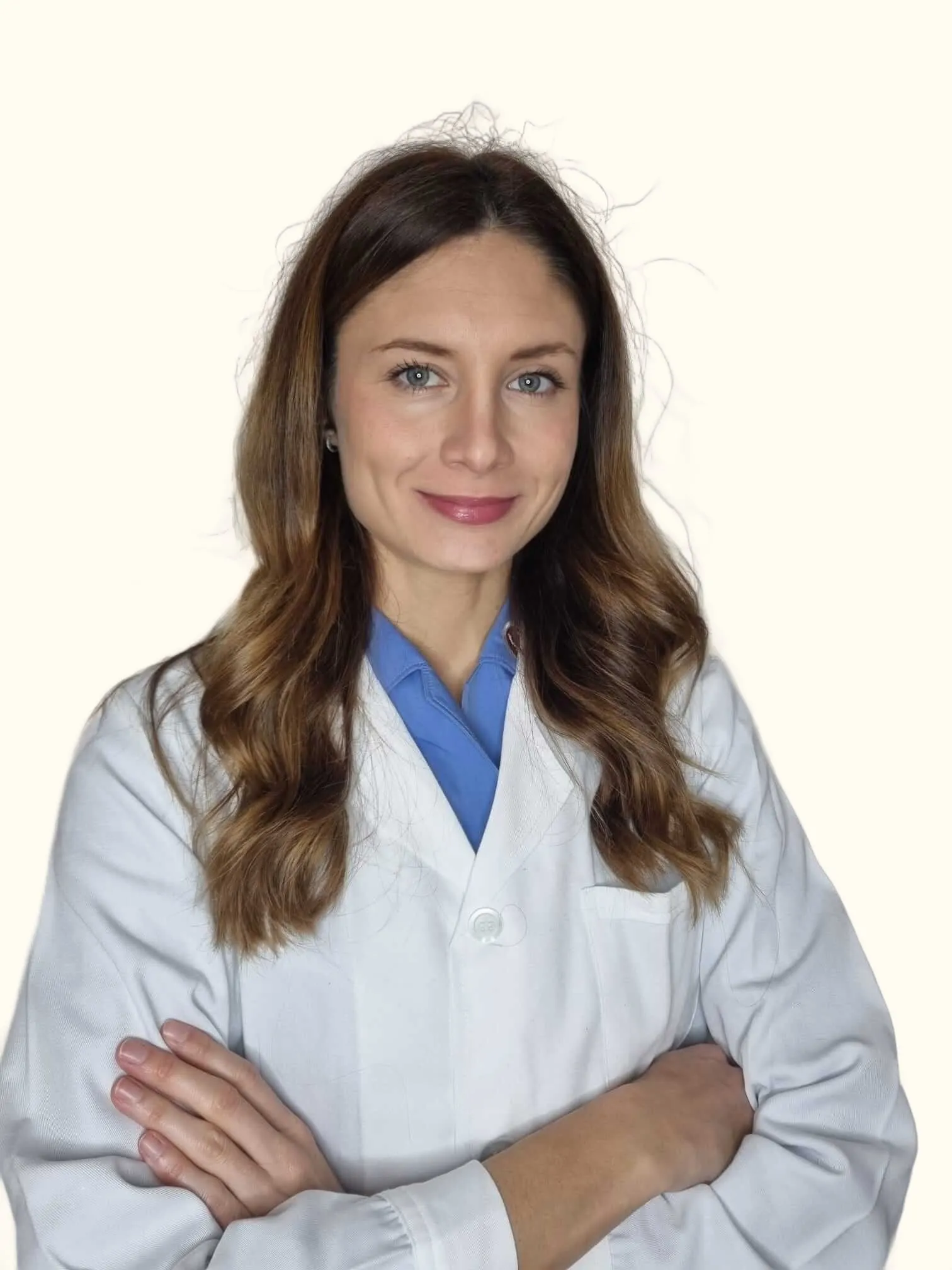 La Dott.ssa Erica Giacomel, Biologa Nutrizionista, in camice bianco
